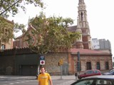 Spain: John in front of a church
